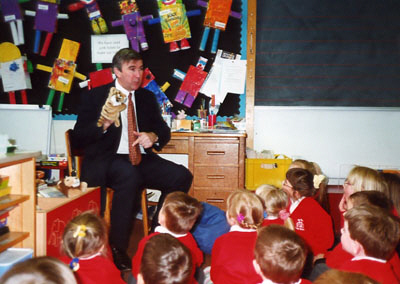 Gervase Phinn with school children